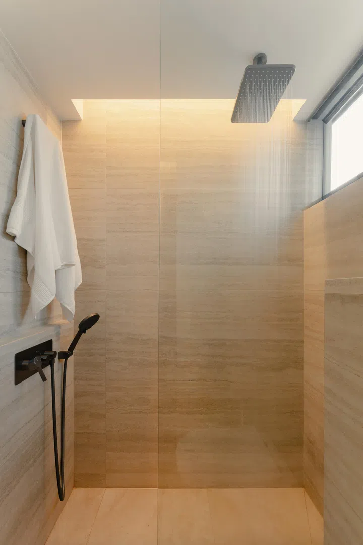 Bathroom in architect Carnation Kng and her Portuguese husband, Lourenço Vaz Pinto’s 4-room resale HDB at Dawson Road.