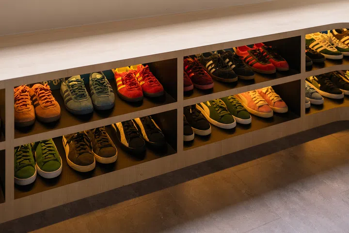 Low cubbies house Jumadi’s many colourways while keeping every pair within easy reach.