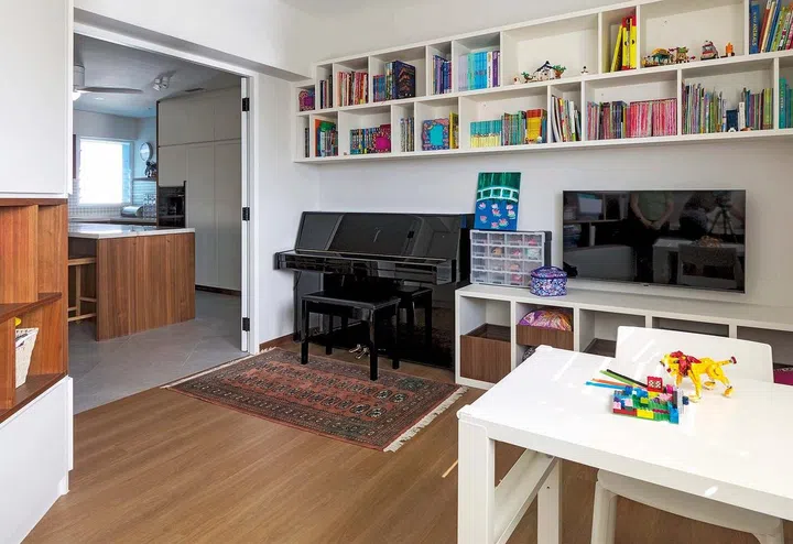 French doors open up into the playroom, which used to be another bedroom in the home’s layout.

