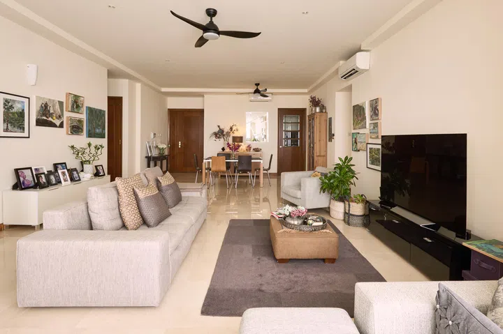 A modern living room styled with natural materials and textures.