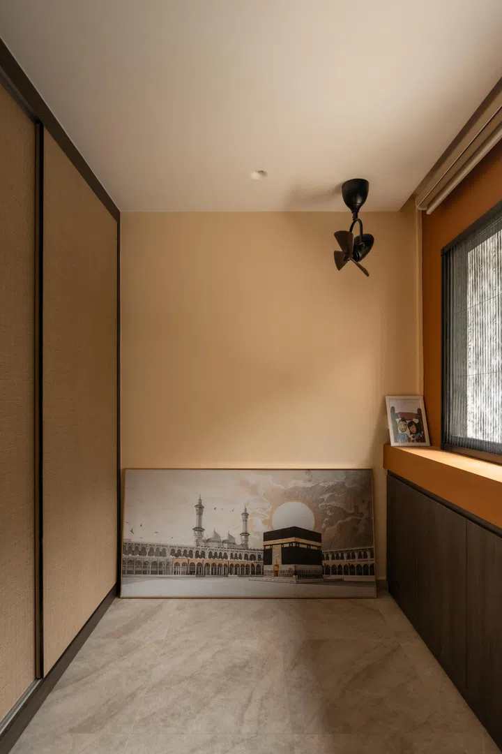 The dedicated prayer nook sits beyond the two-way wardrobe, allowing either space to be used independently while preserving the tranquillity of the bedroom.