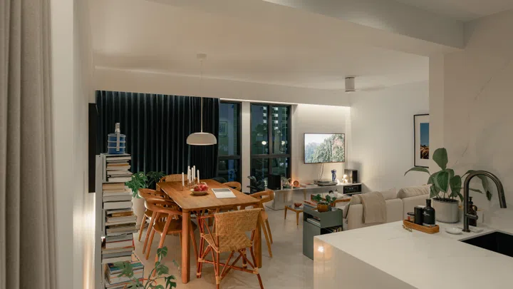 Living and dining areas in architect Carnation Kng and her Portuguese husband, Lourenço Vaz Pinto’s 4-room resale HDB at Dawson Road.