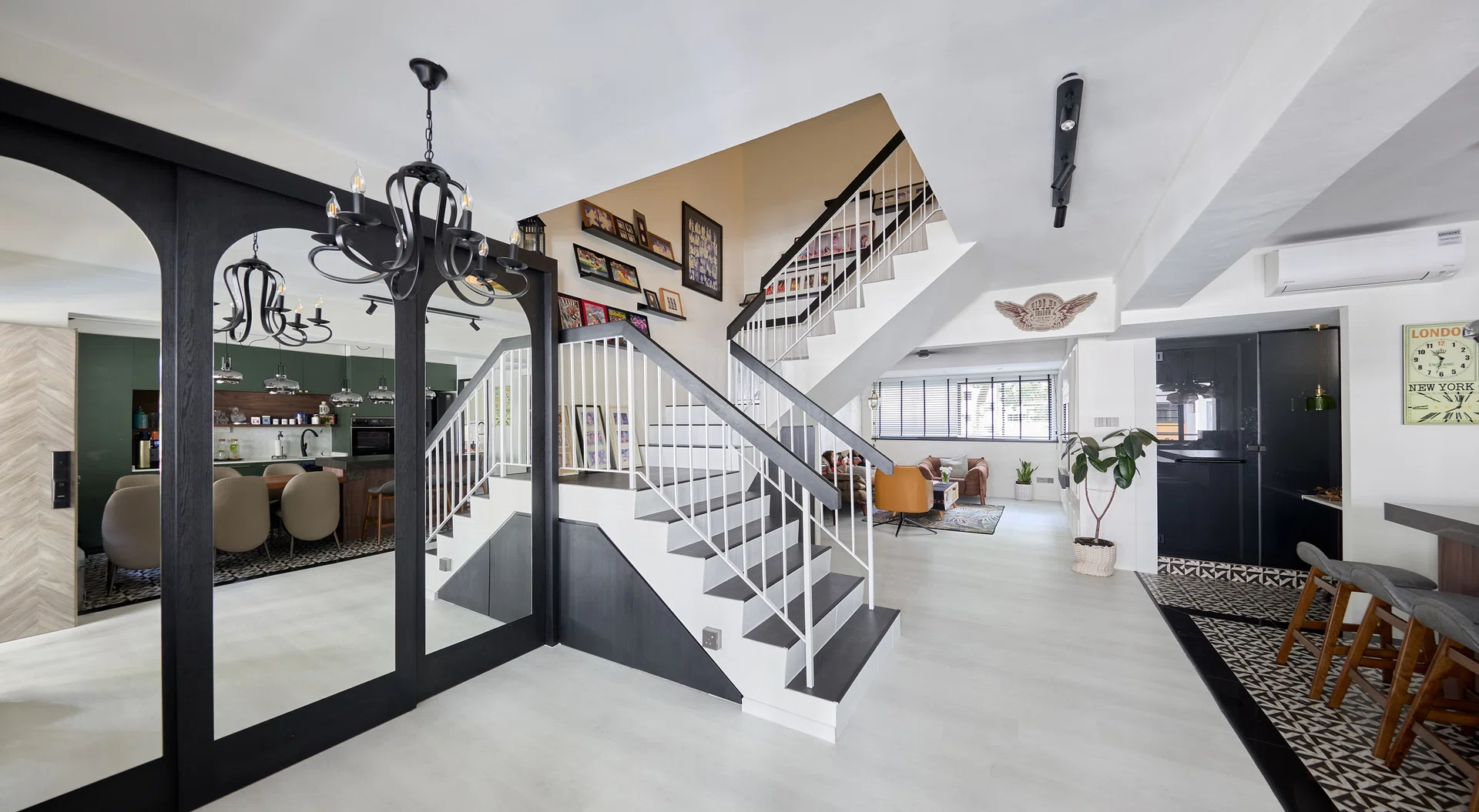 Living room and staircase in a HDB Executive Maisonette along Woodlands Drive for a family of 5.