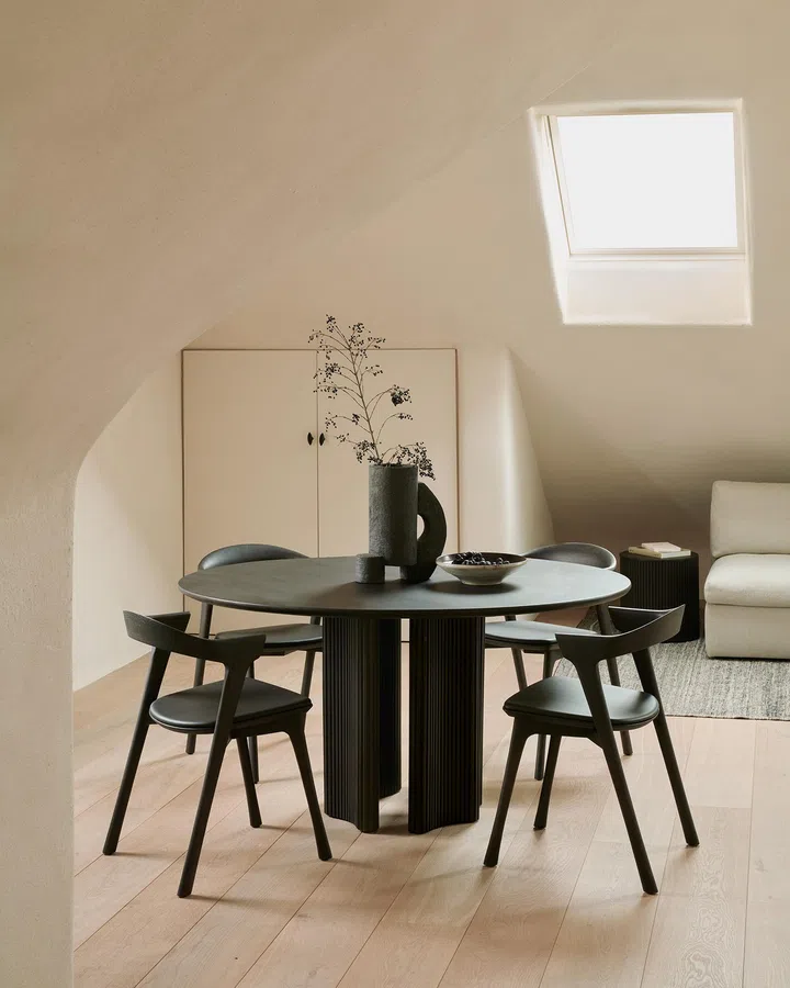Round dining tables can improve circulation and conversation in the right layout, but the best shape ultimately depends on how the surrounding space is used.