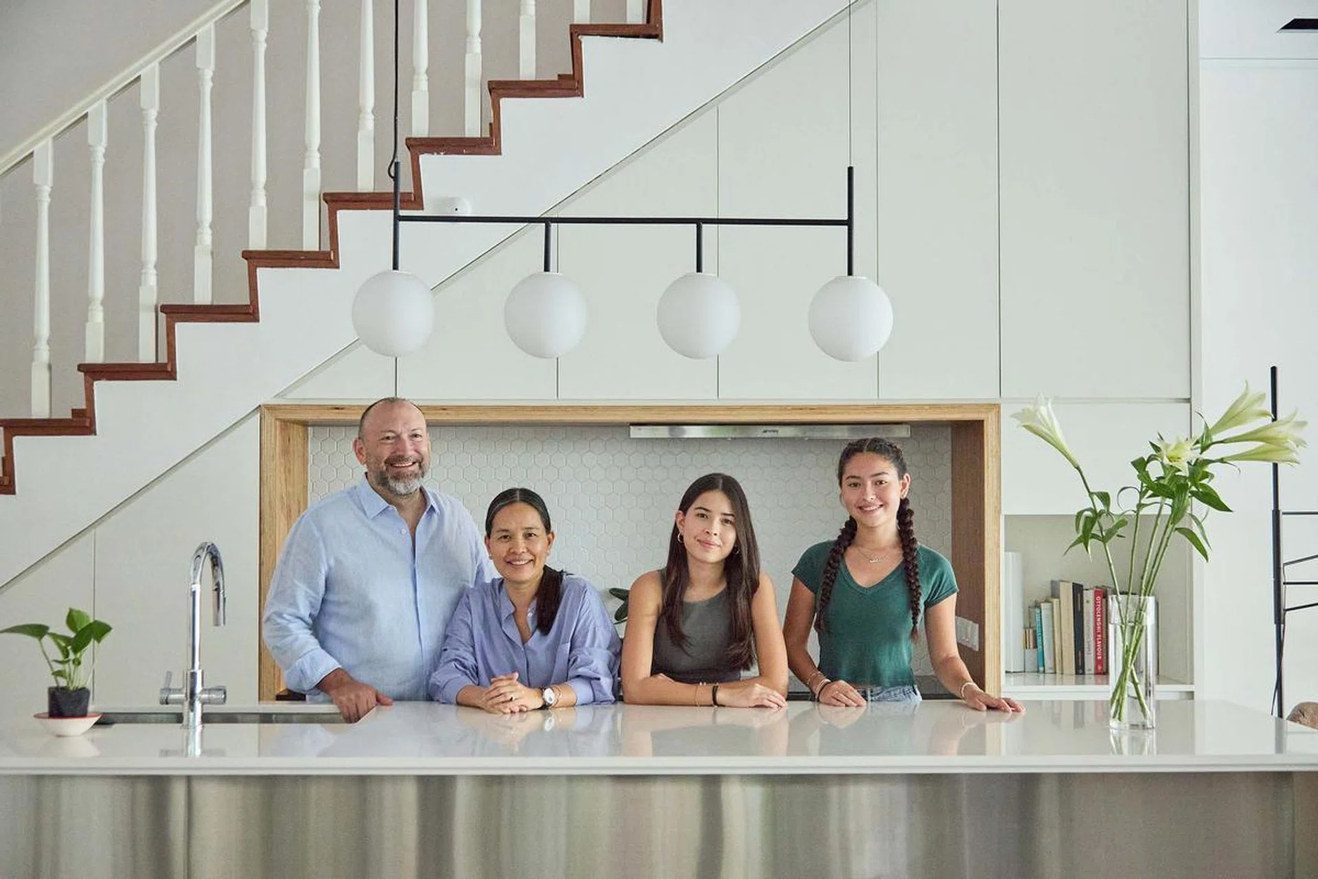 A family of 4 and their two cats lives in this 3,990 sq ft semi-detached home at Frankel Estate. Interior design by Museum Squad.