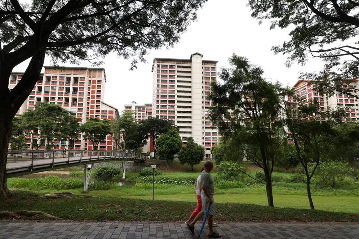 A couple walking. Generic photo of HDB and daily life in Singapore, 14 August 2024. HDB, flats, Singaporeans, cost-of-living, inflation, population, families, daily life, public housing, exercise