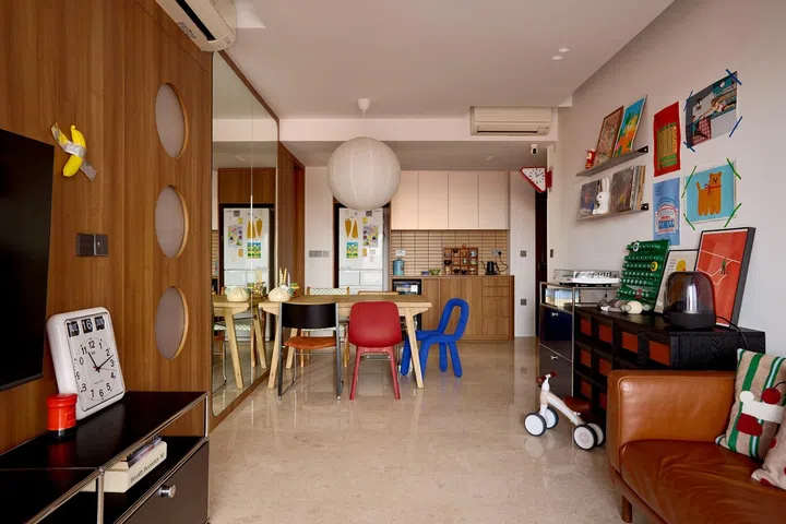 The open-plan living and dining area reflects the couple’s design philosophy: timeless finishes enlivened with colourful furniture and meaningful objects that will grow with them.