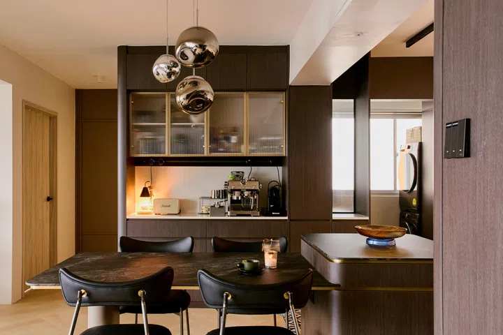 Dining table setup in a 5-room HDB BTO in Woodlands.