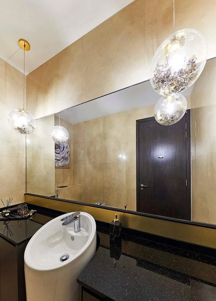 Luxurious marble bathroom in this 4-storey terrace house in Telok Kurau.
