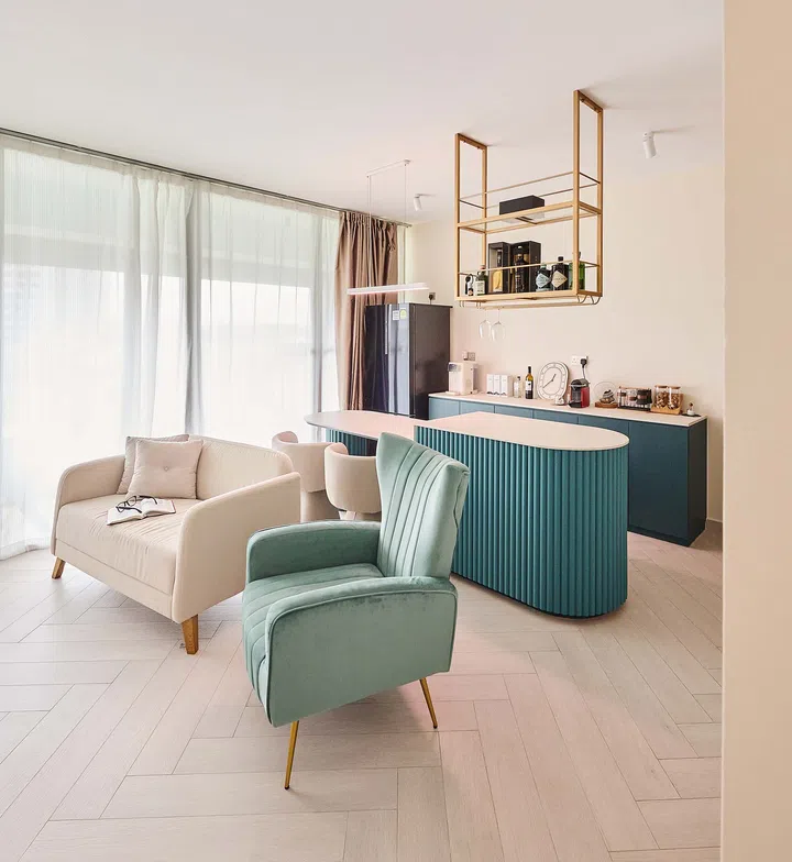 Scenic view of the balcony directly from the curved bar island, reinforcing the island’s role as a multifunctional social and relaxation hub in the home.