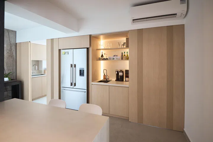 Kitchen and home bar in a couple’s 4-room BTO (1,001 sq ft) in Punggol.