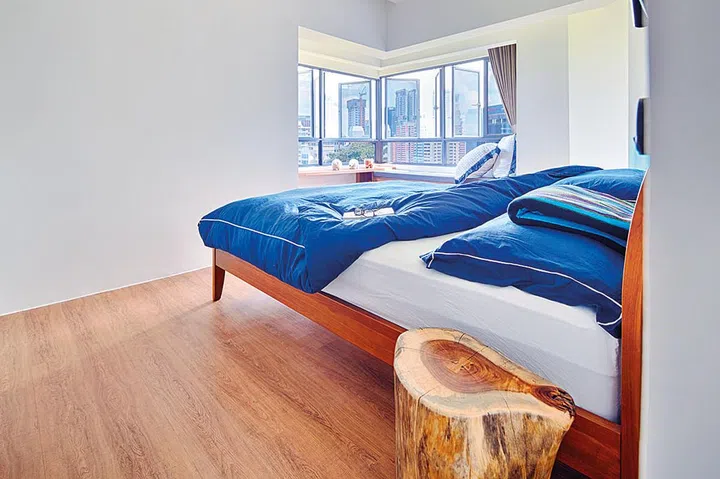 The master bedroom features a window seat, where the homeowners can enjoy views of the vicinity.