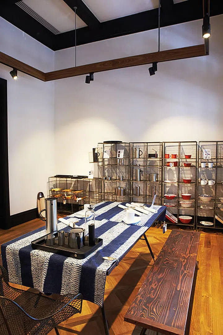 In the background, the Lostine wire shelves house Falcon enamelware and Stelton jugs.