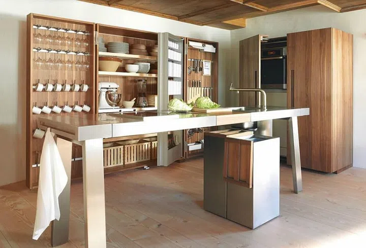 If you want an open-concept kitchen perfect for your entertaining needs, consider kitchen systems instead. Bulthaup kitchen system pictured.