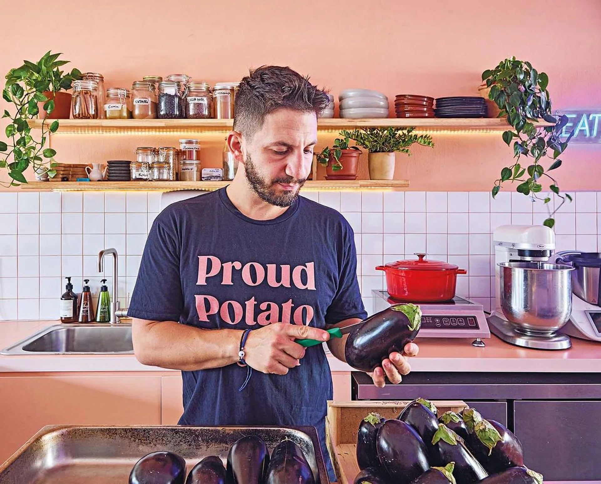 For Alberto, the heart of the home setting is a Mediterranean-inspired kitchen with apricot coloured walls.