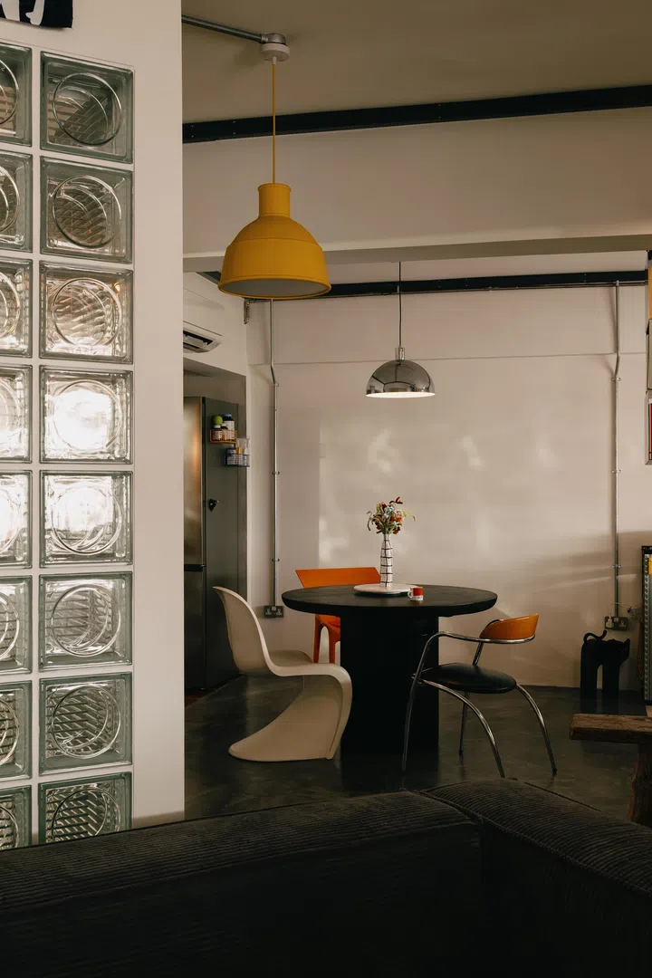 The Dining Area with touches of Mid-Centruy Modern chairs.