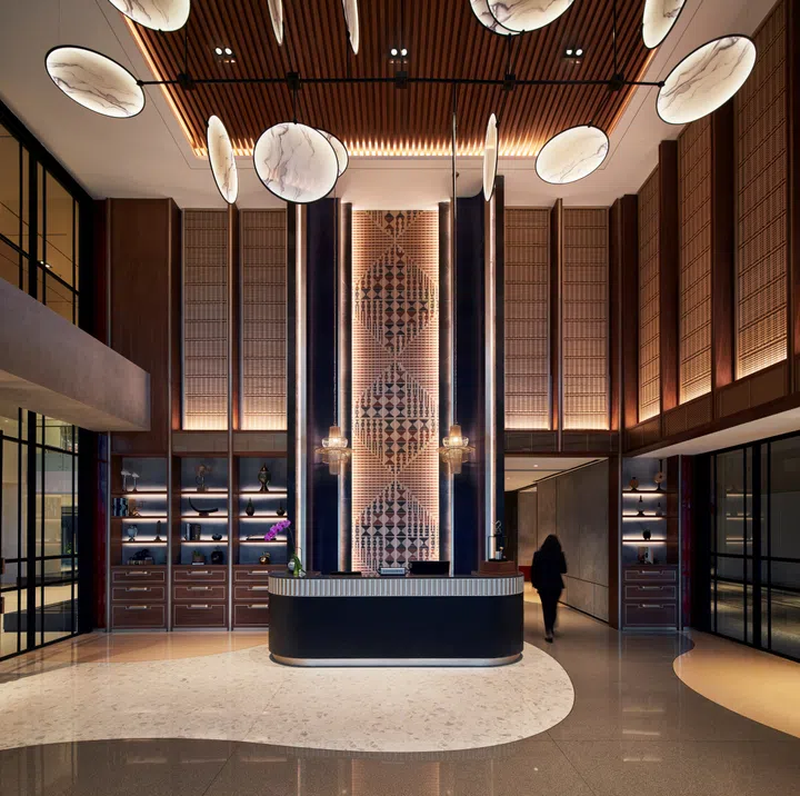 Concierge in the Episode Hotel Gading Serpong, designed by Hirsch Bedner Associates (HBA).