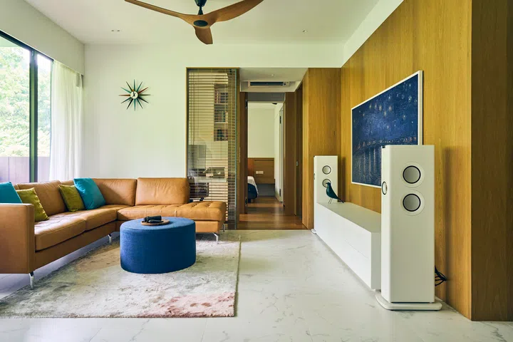 Timber cladding runs throughout the house in a continuous language.