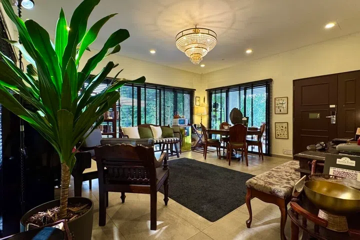 Curated pre-loved pieces bring immense charm to the interior, seamlessly styled together to create an elevated, warm colonial throwback amidst surrounding nature.