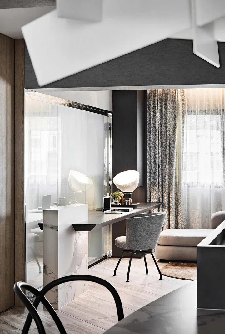 The study area connects the bedroom to the rest of this HDB executive apartment at Rivervale Plains.