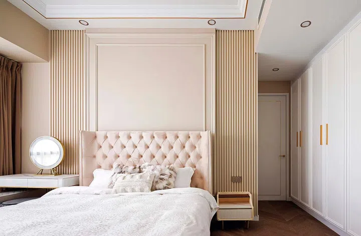 The tufted headboard in the master bedroom was a smart choice as it imbues a touch of old-world glamour into the sleeping zone.