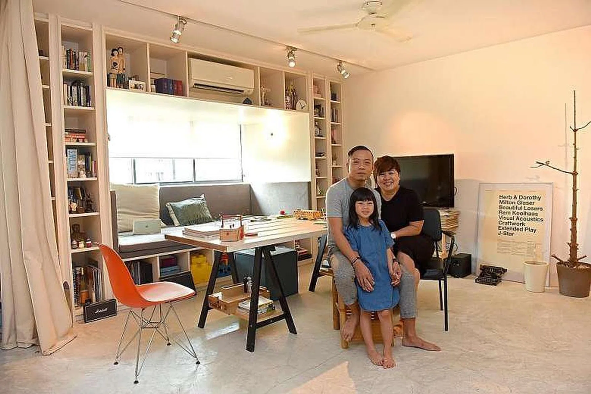A wall in the master bedroom features about 60 items, each holding a memory of six-year-old Trevi, daughter of Mr Dennis Cheok and his wife, Maggie.