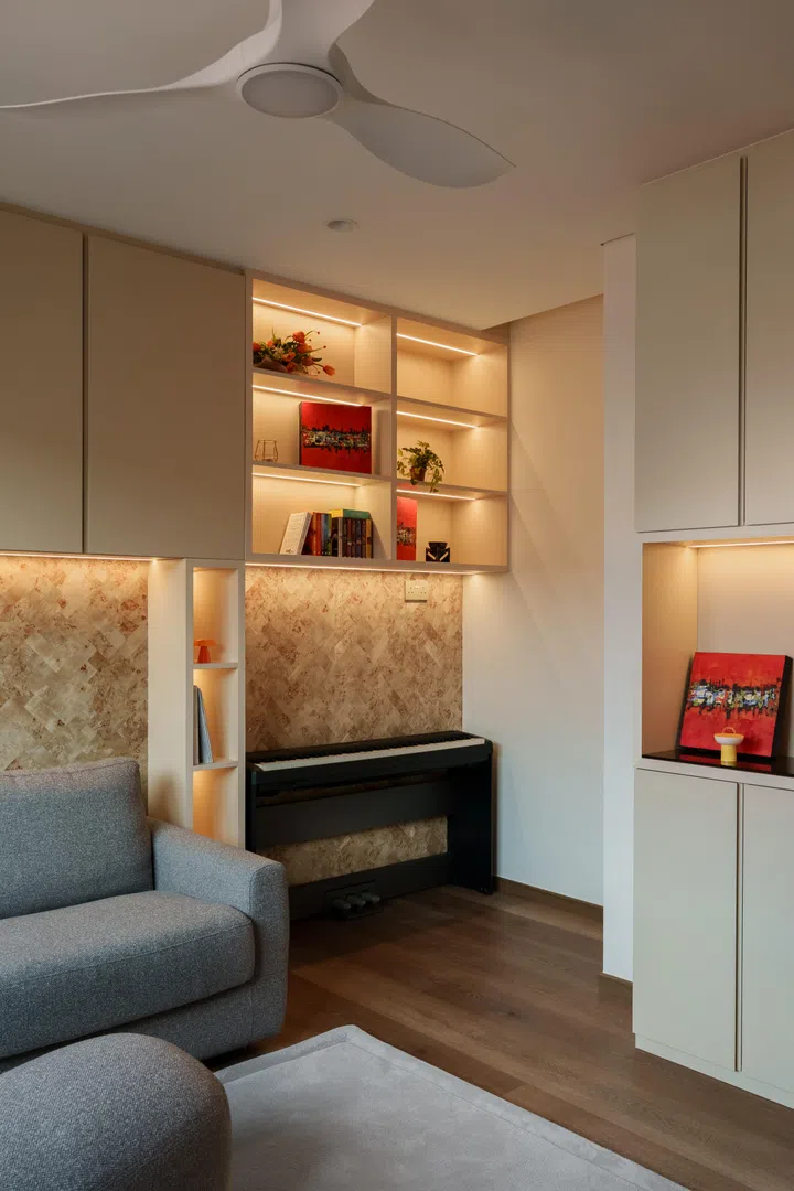 What began as a conventional spare bedroom became a flexible project room for music, reading, crafts, and occasional overnight guests.