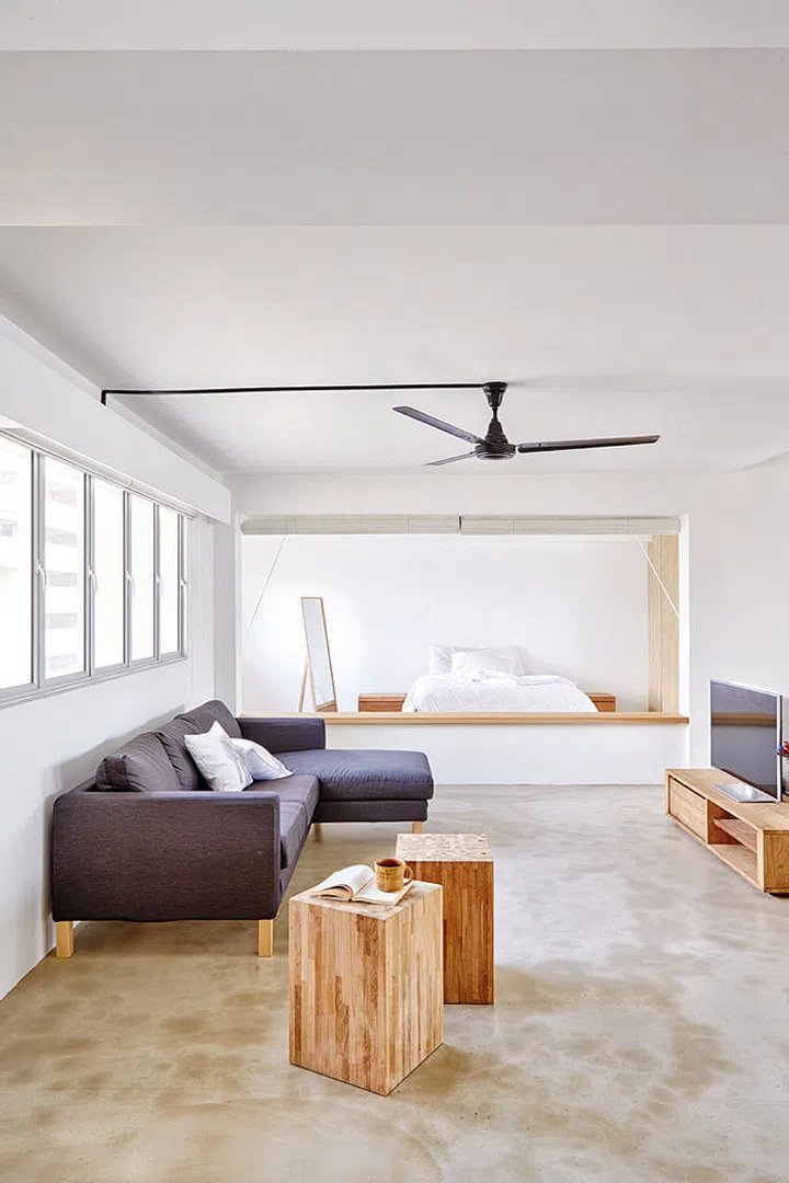 The open concept in this Jumbo HDB (3-room and 4-room merged) was taken to the extreme in this abode. Even the sole bedroom was left without any doors or walls to fully enclose it. The closest thing to privacy for the room is achieved with bamboo blinds. Renovation cost $64,000 excluding furniture.