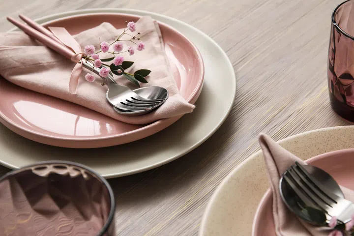 Stylish table setting on wooden background.