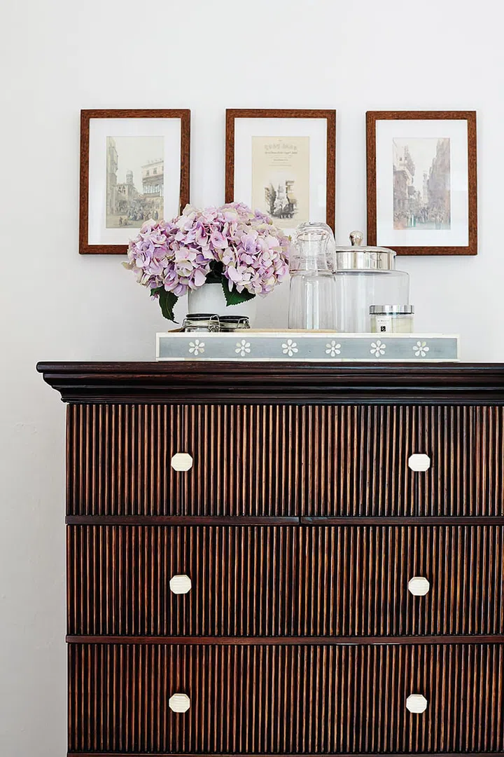 The beautifully layered decor and framed photograph details found at every corner of this 5,000 sq ft colonial bungalow home near Harbourfront is testament to homeowner Davina's experience in styling events.