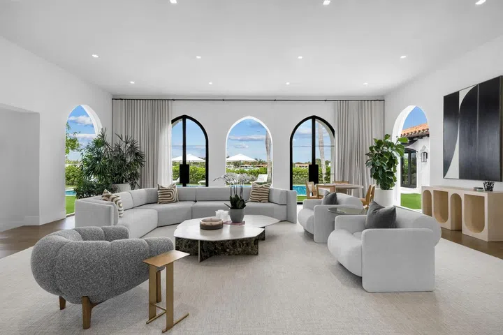 The stunning 12,450-square-foot mansion includes lots of space for living and lounging.