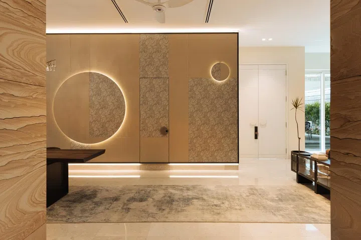 In the dining room, a 5m x 3.5m feature wall with 2 circular light motifs stand out - in a semi-detached at Jalan Belibas, Upper Thomson.