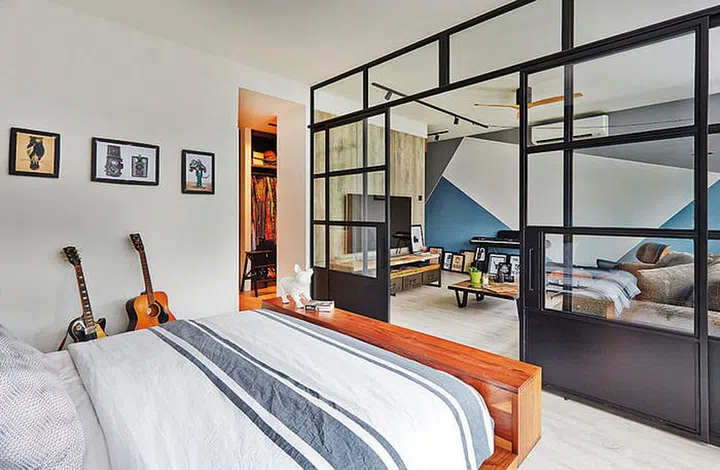 The glass partition separating the bedroom from the living space makes the room look more spacious, says Desmond.