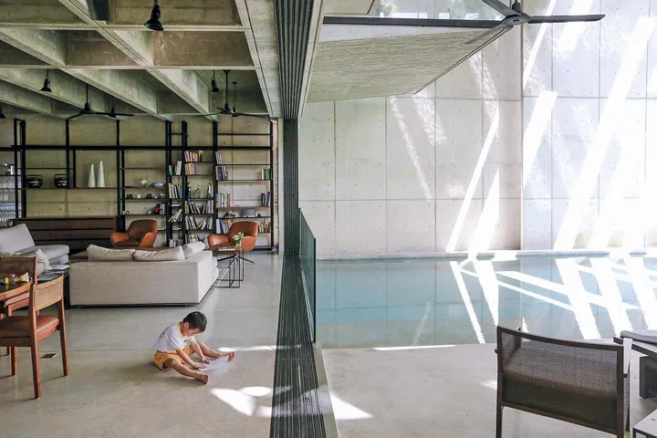 Light and shadow animate the surfaces throughout the day in the Chempenai House, Kuala Lumpur.