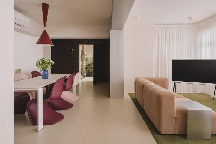 The living room was formerly two small bedrooms, which were knocked down and converted into one room.