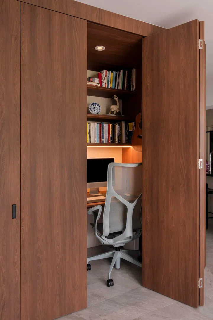 The study nook doubles as a shared workspace, compact yet efficient.
