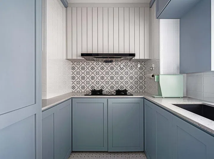 Kitchen with blue cabinets