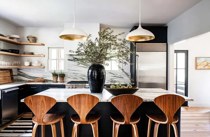The kitchen features Cherner chairs.