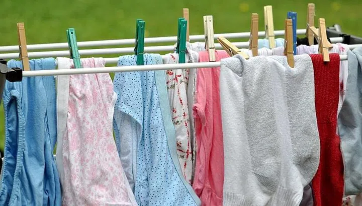 21306883 - laundry drying on a rack
