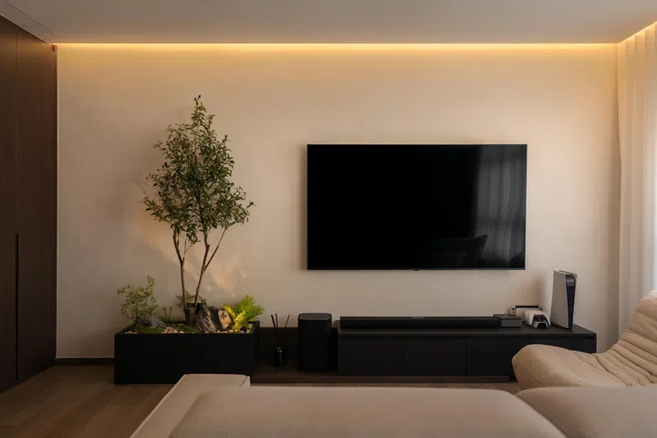 Living room TV console in a 5-room HDB BTO at Tampines Street 96 (1,216 sq ft), designed by Inizio Atelier.