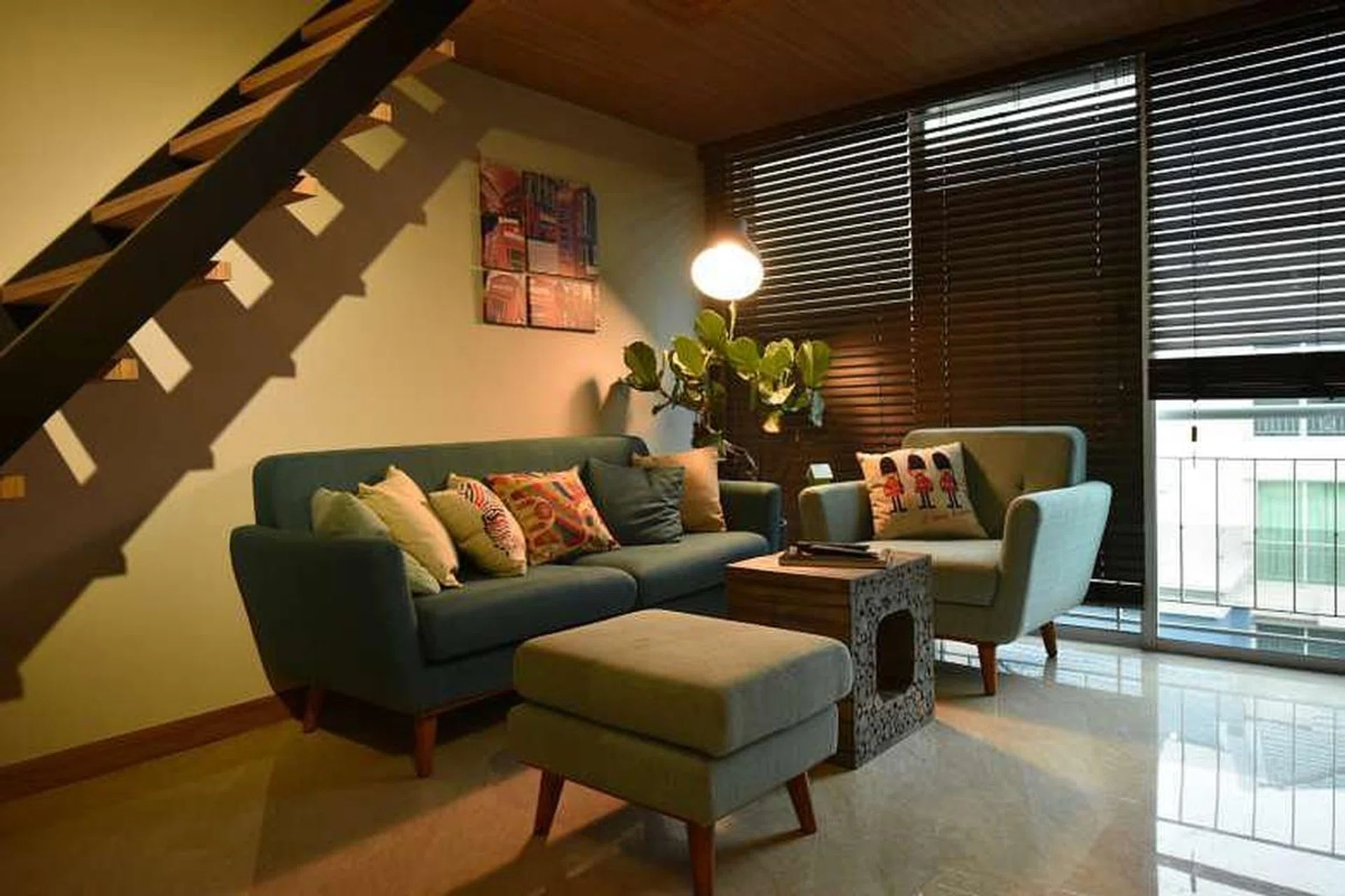 Living room of a 2-bedroom condominium apartment in Sembawang that was turned into a cool loft!