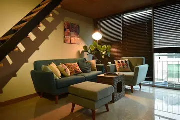 Living room of a 2-bedroom condominium apartment in Sembawang that was turned into a cool loft!