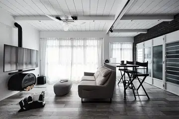 Living room in a New York loft-style 3-room HDB BTO in Punggol, designed by Space Sense.