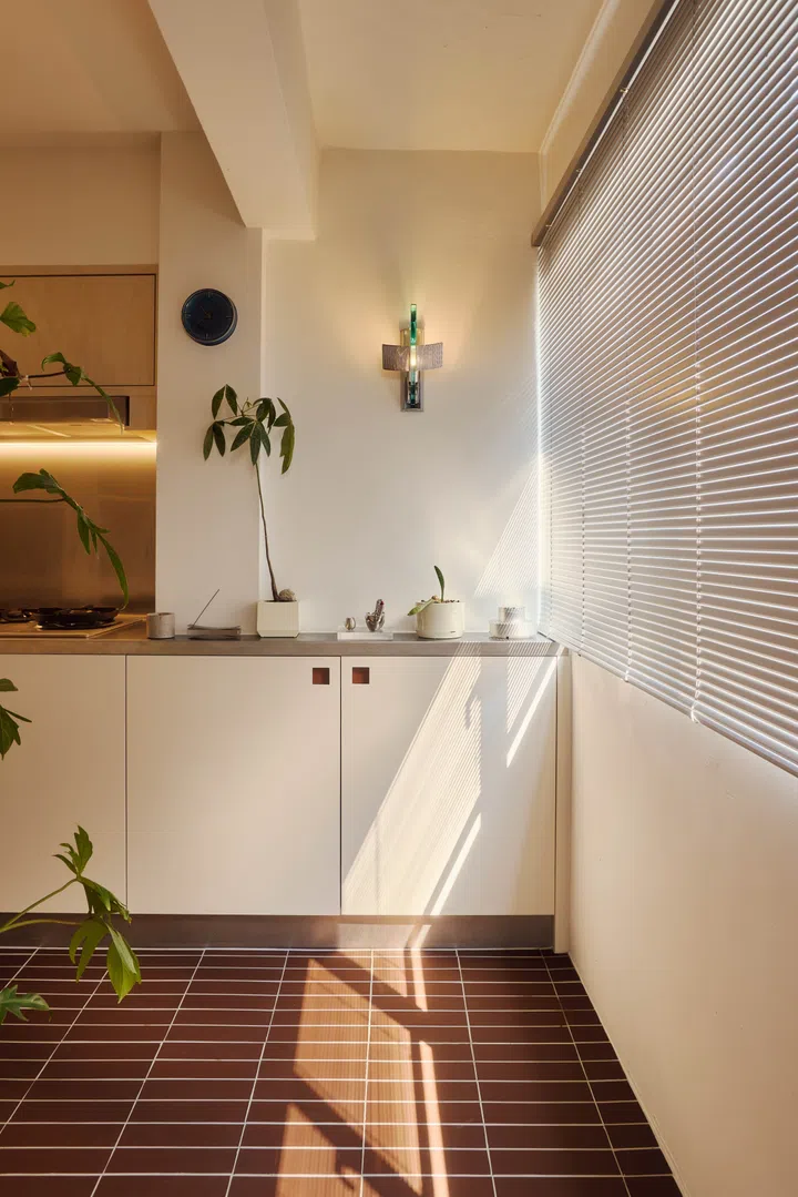 Lots of storage space was created in the long, linear-layout kitchen.
