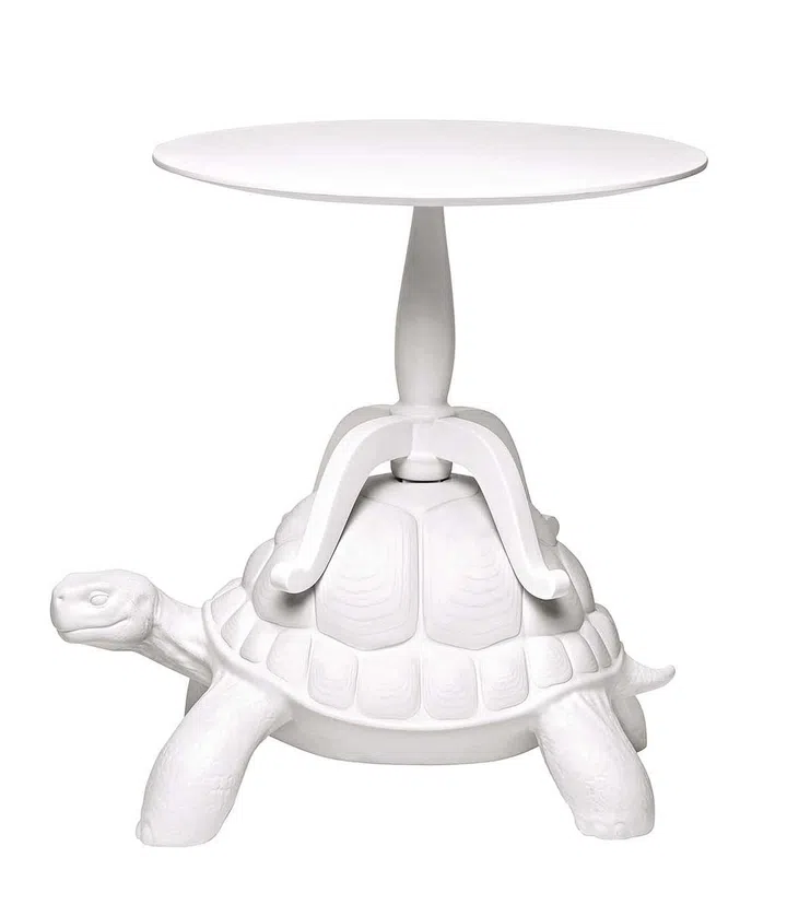 Sometimes it happens to make a surreal dream that we can’t think rationally with eyes wide open. But how would it be to wake up right after and find a turtle carrying you a cup of coffee? Turtle Carry Coffee Table designed by Marcantonio, carries on its carapace a wooden coffee table firmly anchored to its base. For your cups of coffee and more!
