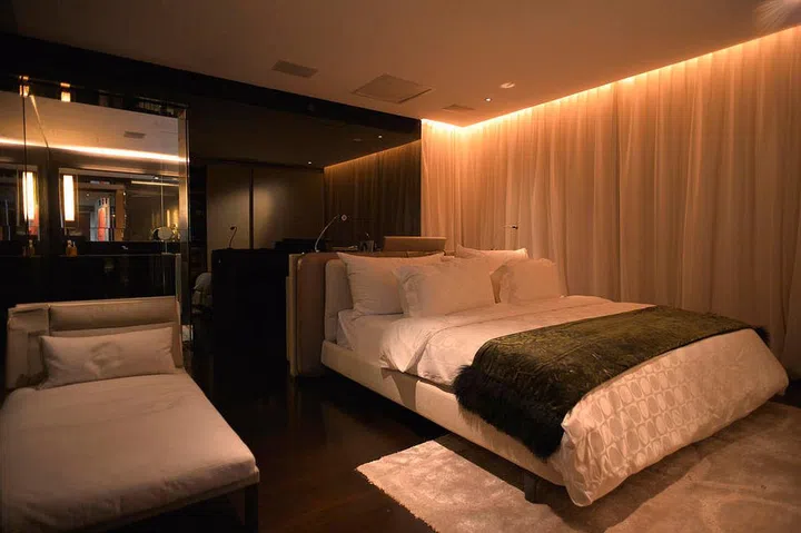 Custom-made Sealy mattress and the Italian Frette bedsheets.