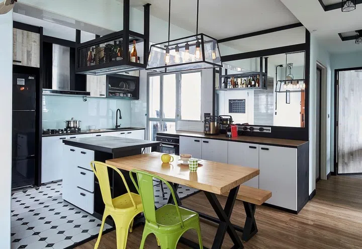 If you don’t have the luxury of space for a large standalone kitchen island as well as a dining table, combine them. Similar hues and textures give a more cohesive look. Alternatively, separate the two with different colours, materials and heights.