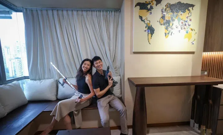 Ms Chew Yirong and Mr Clyde Lim woodworked several pieces of mahogany furniture by hand.