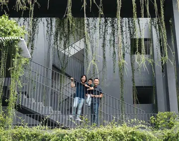 Homeowner Lester Goh (pictured with his wife and son)