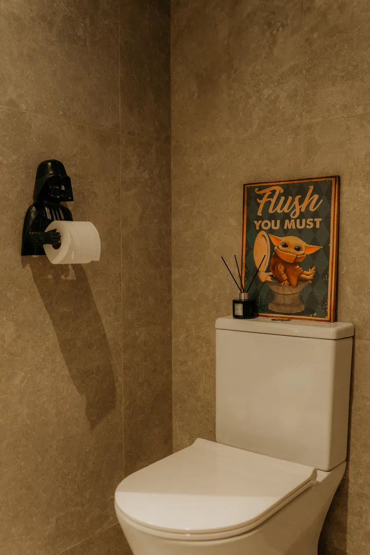 A Darth Vader holder and Grogu print add a cheeky touch to an otherwise functional space.